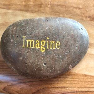 Brown Stone with Gold 'Imagine' Inscription